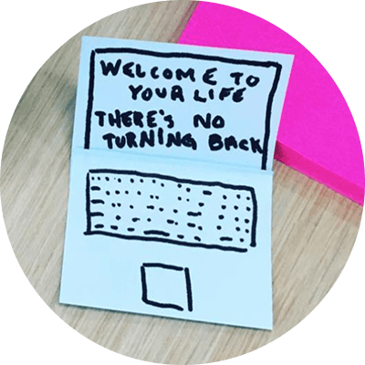 Coffee cup and 'welcome to your life' sketch